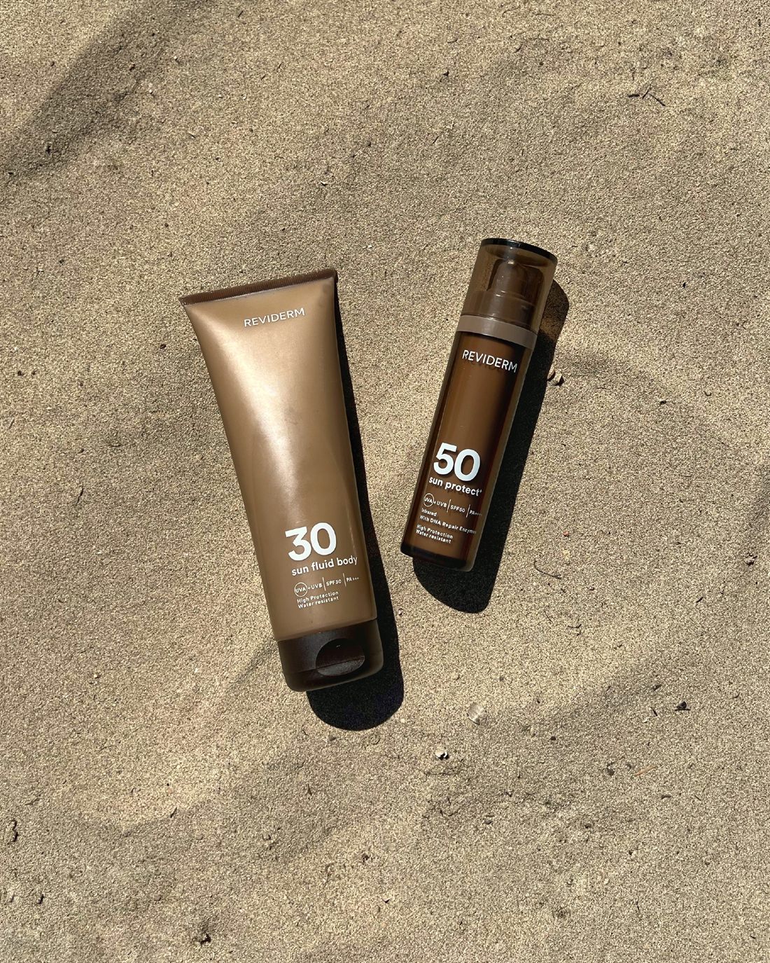 REVIDERM Sonnenpflege auf Sand